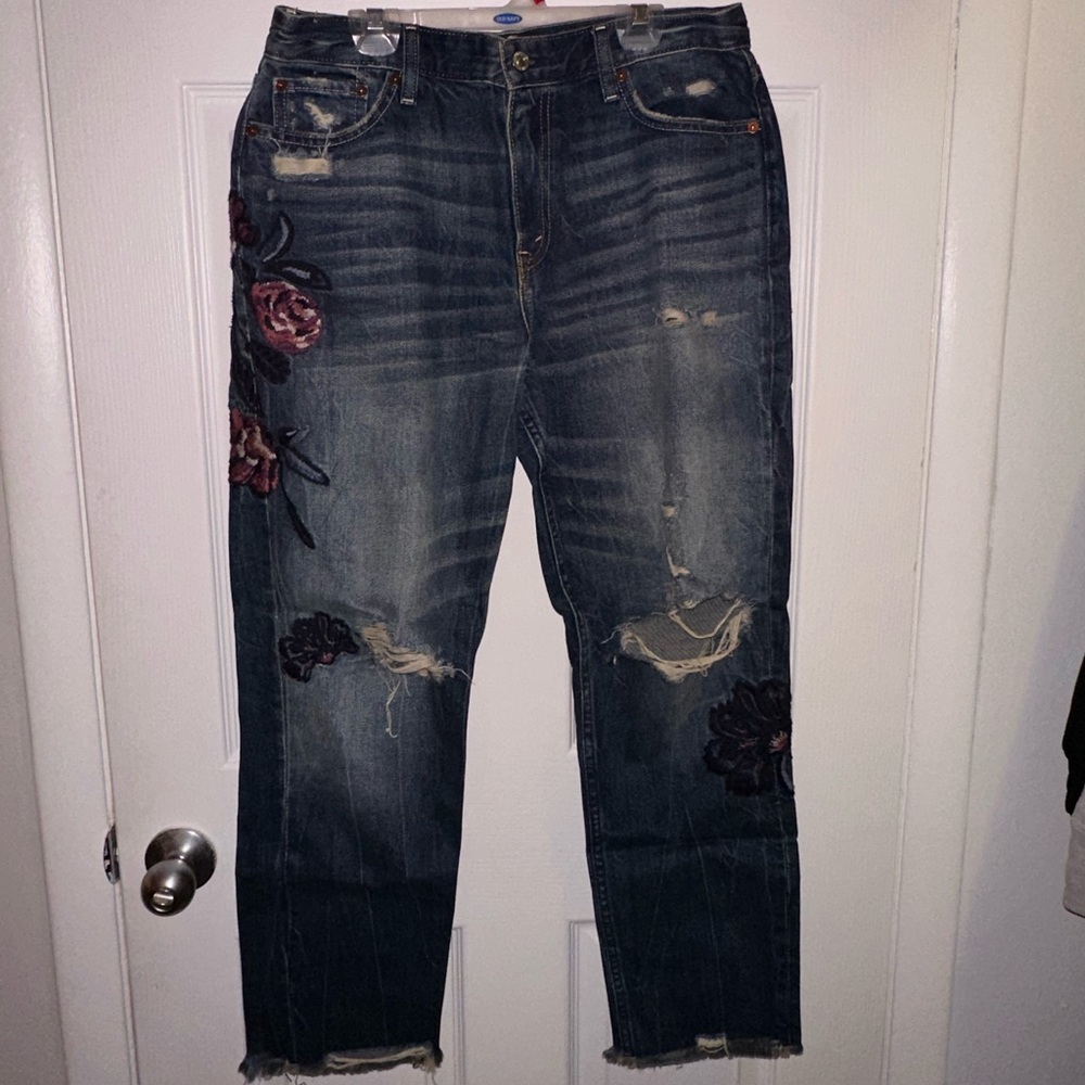 Girlfriend jeans with flower patch designs. Size 8